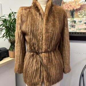 Vintage Muskrat, belted, let-out construction